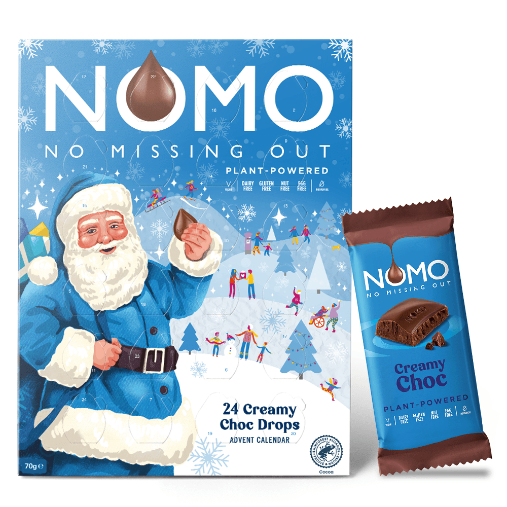 Nomo Advent Calendar box and a single wrapped creamy choc drop pack on a white background. The blue box features Santa Claus and winter holiday illustrations.